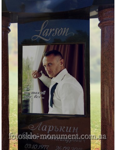 Пам'ятник з чорного і червоного граніту з фотографією в склі